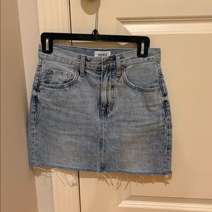 Pistola size 24 Denim Frayed  Skirt, color is "Brooklyn."